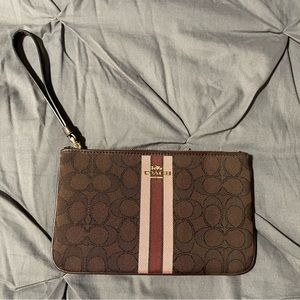 New, never used Coach wristlet